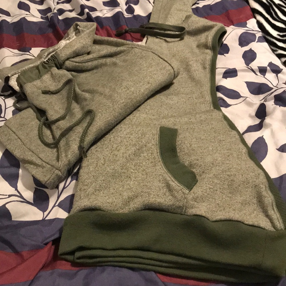 Ashley Stewart joggers and sleeveless hoodie.